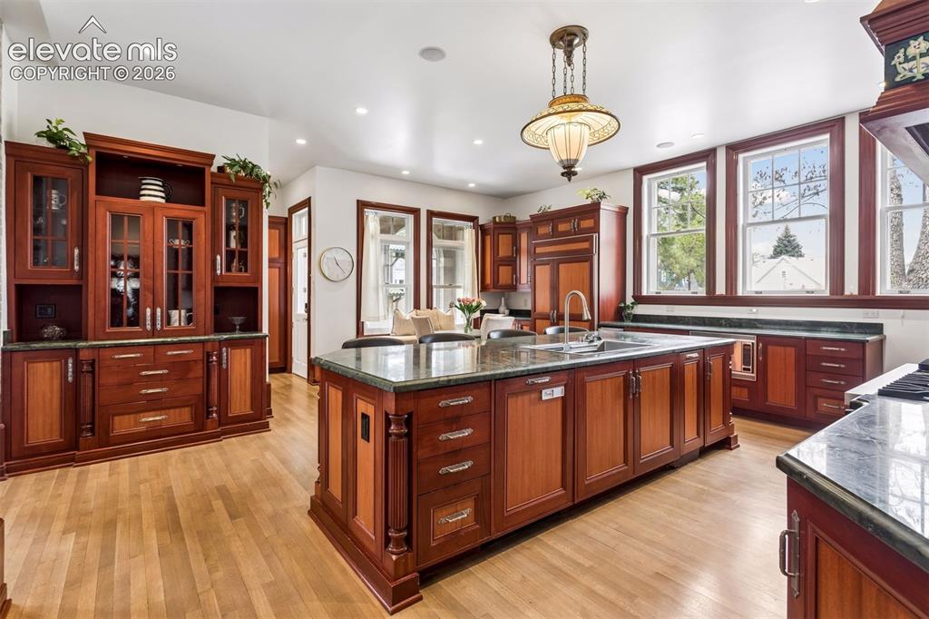 Image 13 of 50: African mahogany cabinetry.