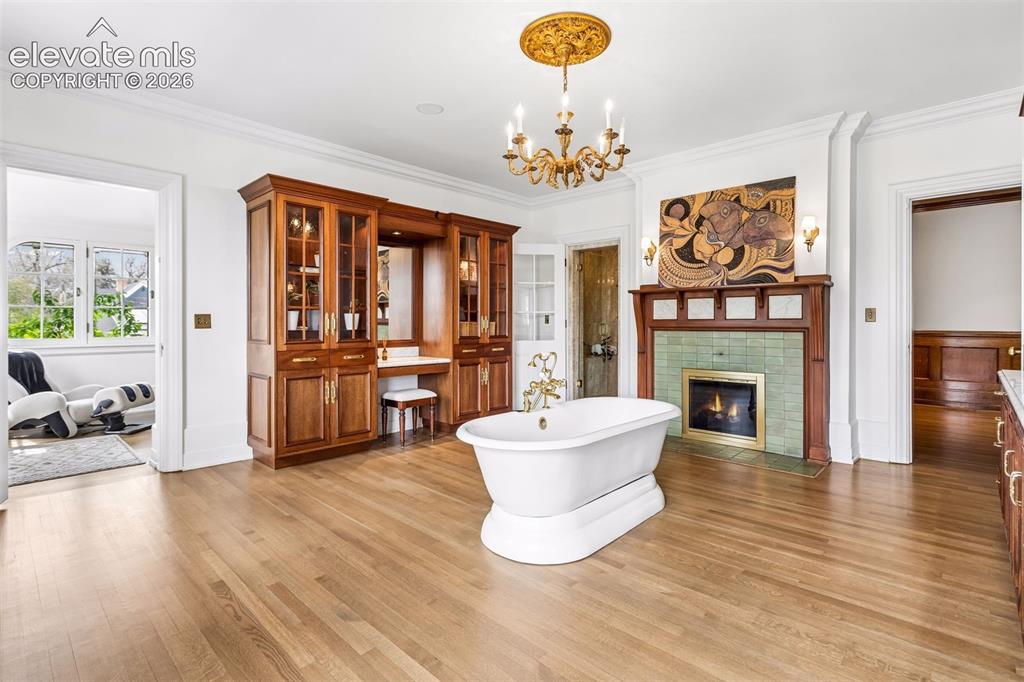 Image 16 of 50: Primary suite bathroom, soaking tub, steam room and 4 of seven Van Briggle