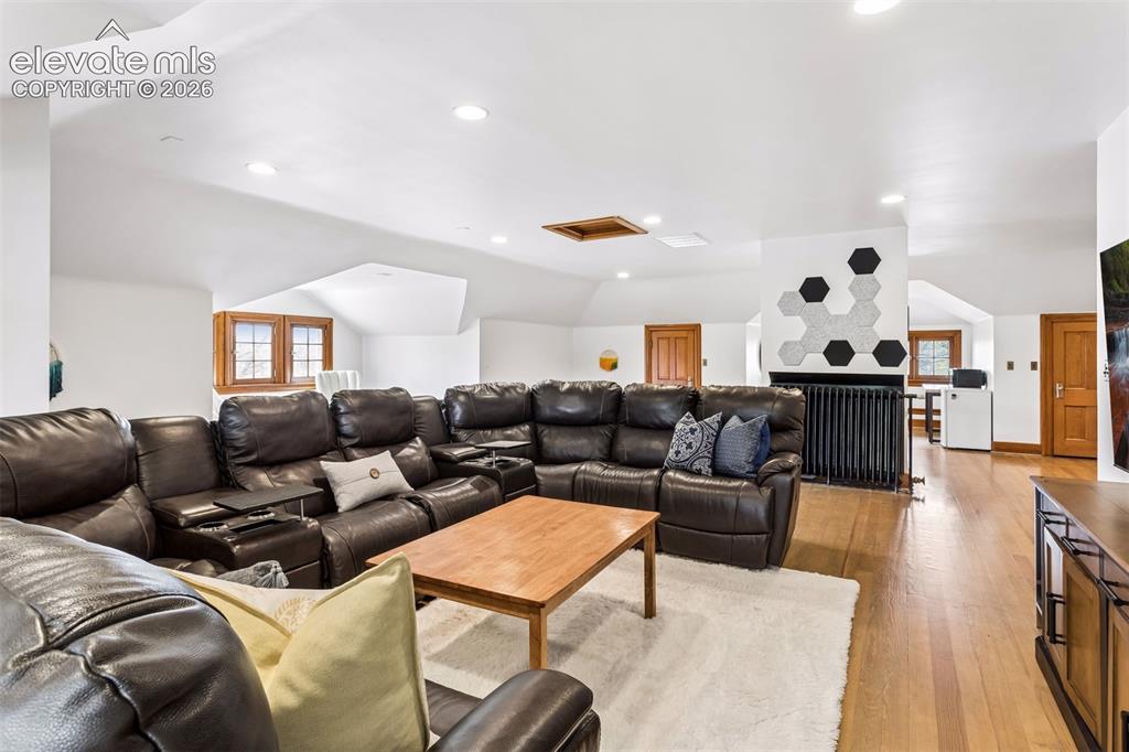 Image 25 of 50: 3rd story large open living area 2 bedrooms, bath and large open living are