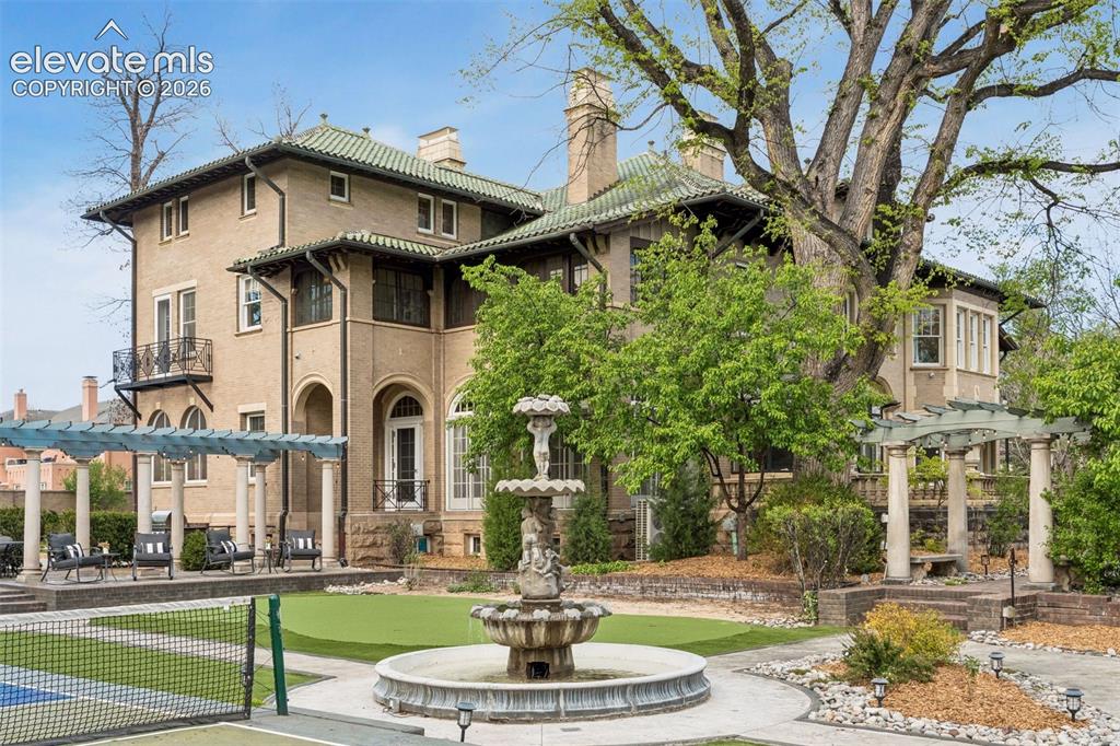 Image 33 of 50: Estate has private pickleball court, putting green, Broadmoor fountain, fir