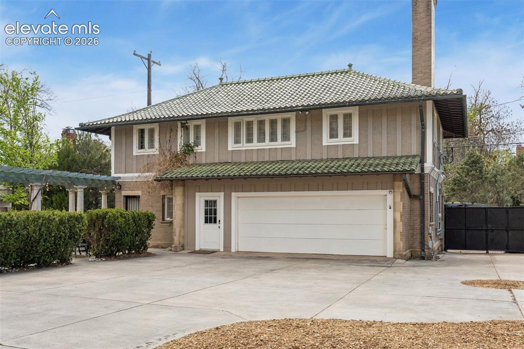 Image 38 of 50: Oversized 2 car garage and 3 bedroom 1 bath guest house.