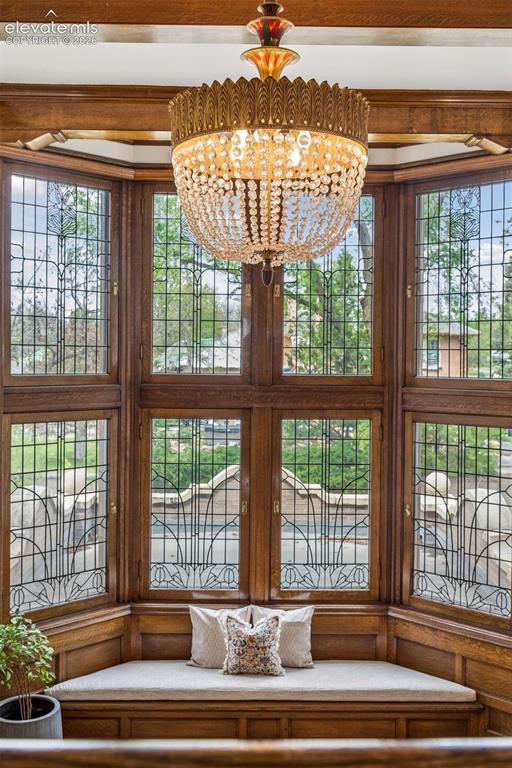 Image 5 of 50: Soaring floor-to-ceiling bay windows of beveled glass imported from Belgium