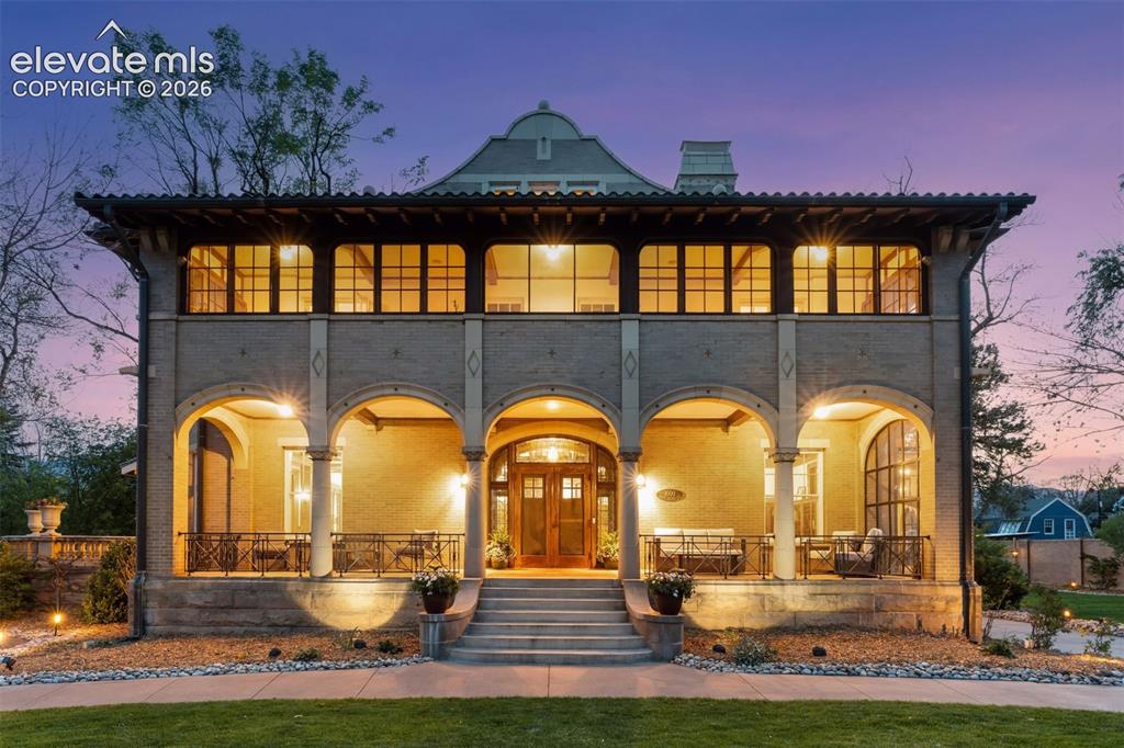 Image 50 of 50: Expansive covered porch and entrance