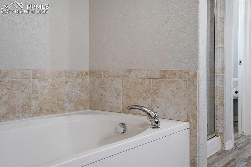 Image 21 of 30: This soaking tub is perfect after a long day