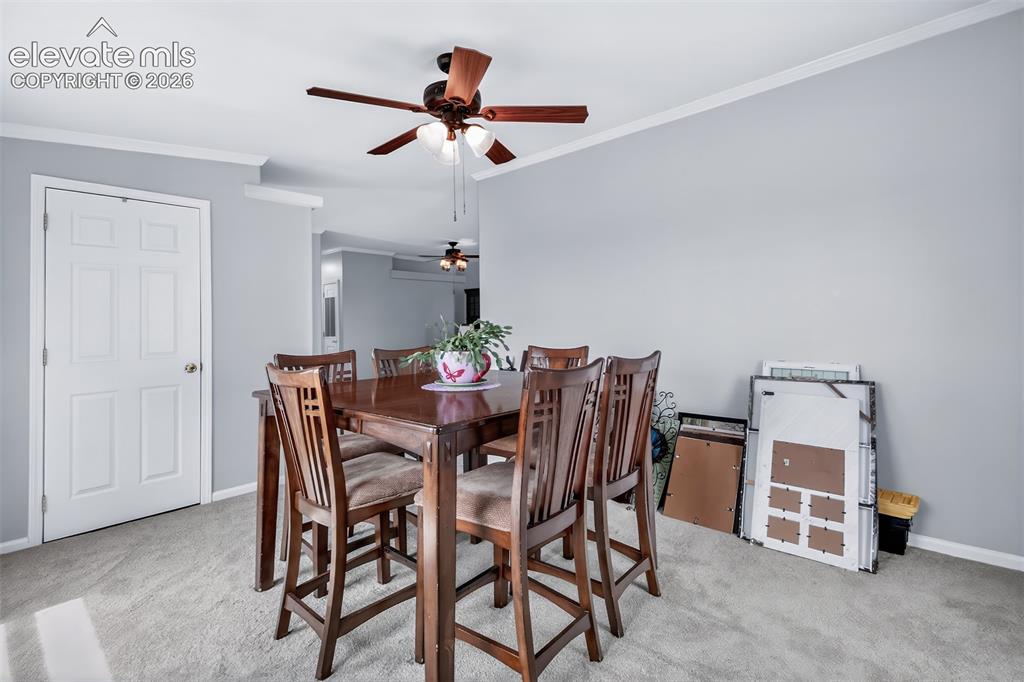 Image 8 of 45: Living room has coat closet on opposite side of entry, living room is curre