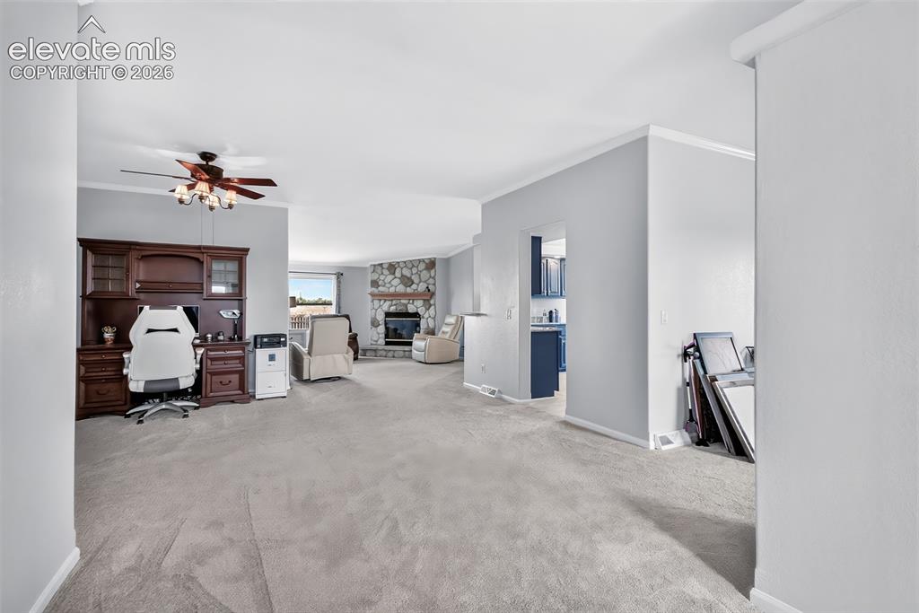 Image 9 of 45: Dining room is currently being used as an office.