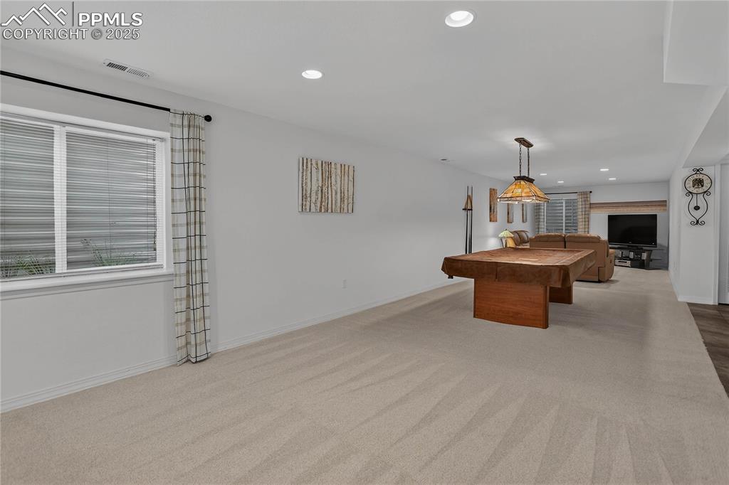Image 21 of 35: Massive rec room - lower level