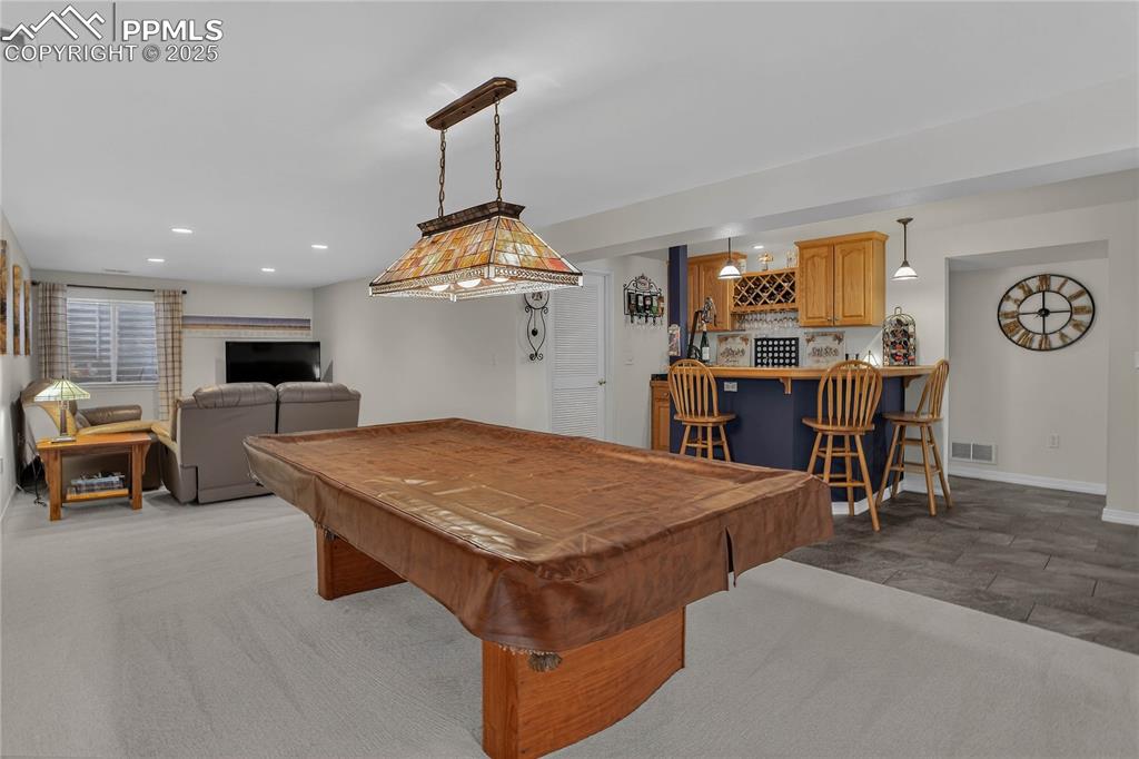 Image 22 of 35: Pool table to convey