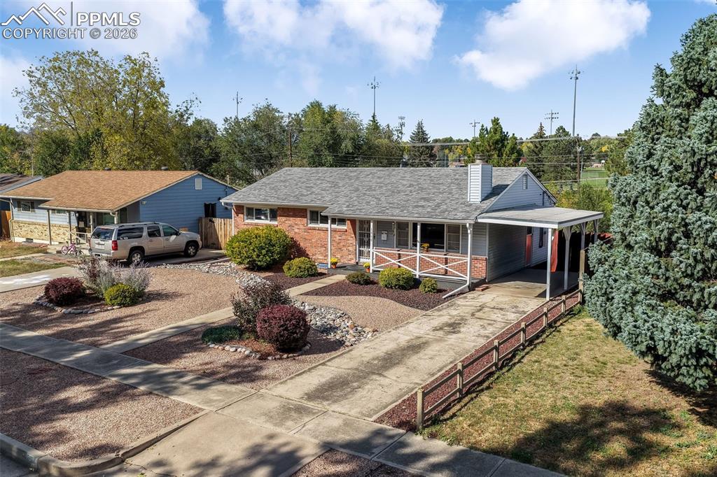 Image 43 of 50: Backyard view of home