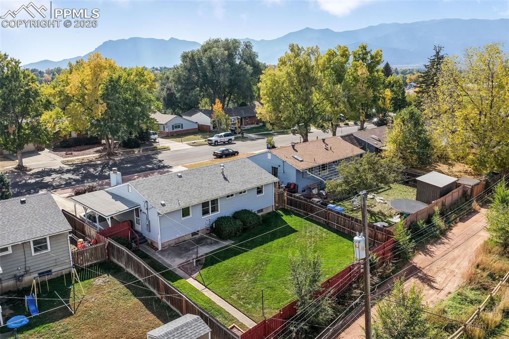Image 46 of 50: Aerial front view of home