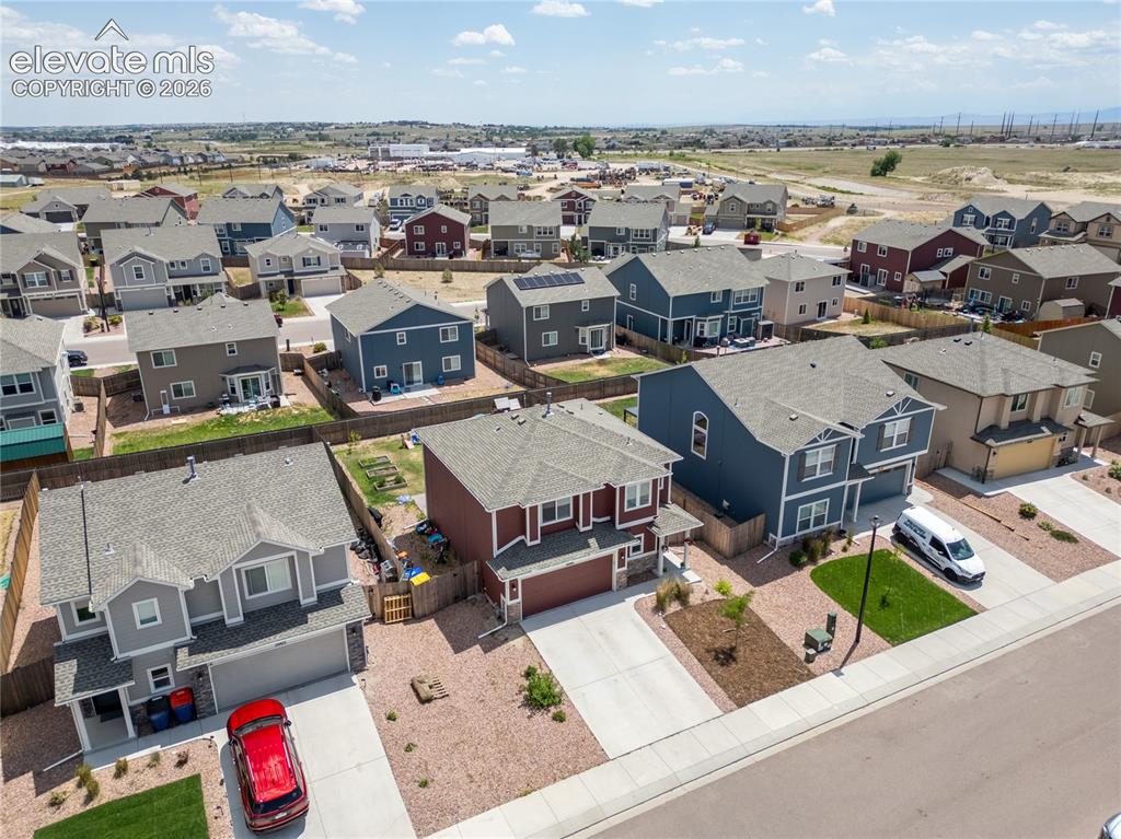 Image 25 of 42: Aerial perspective showcasing a residential neighborhood with diverse archi