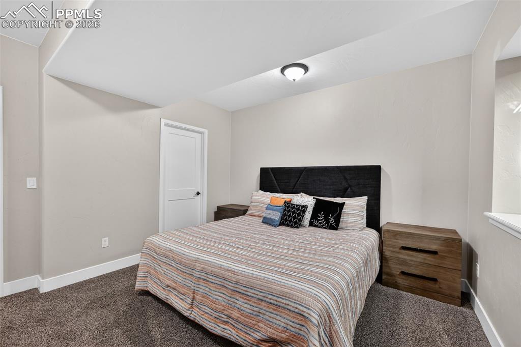 Image 45 of 50: lower level bedroom