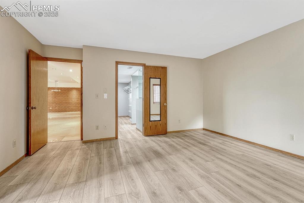 Image 22 of 50: Master Bedroom