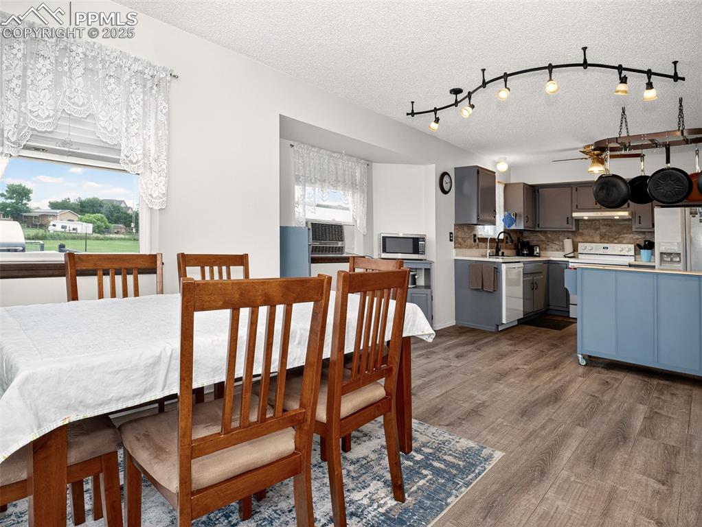 Image 12 of 45: Dining room looking to kitchen
