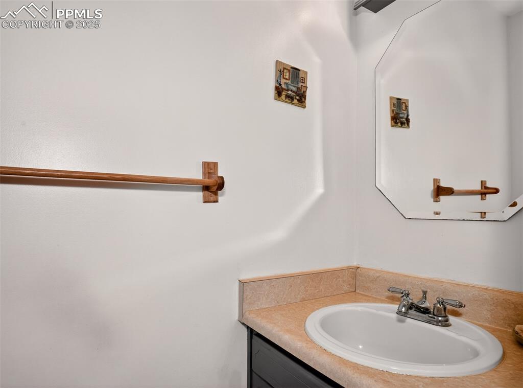 Image 8 of 45: Half bathroom near living room