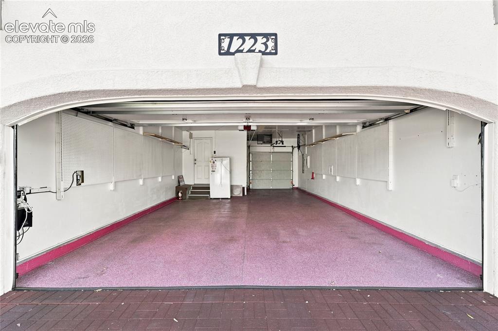 Image 40 of 42: 3 car tandem garage