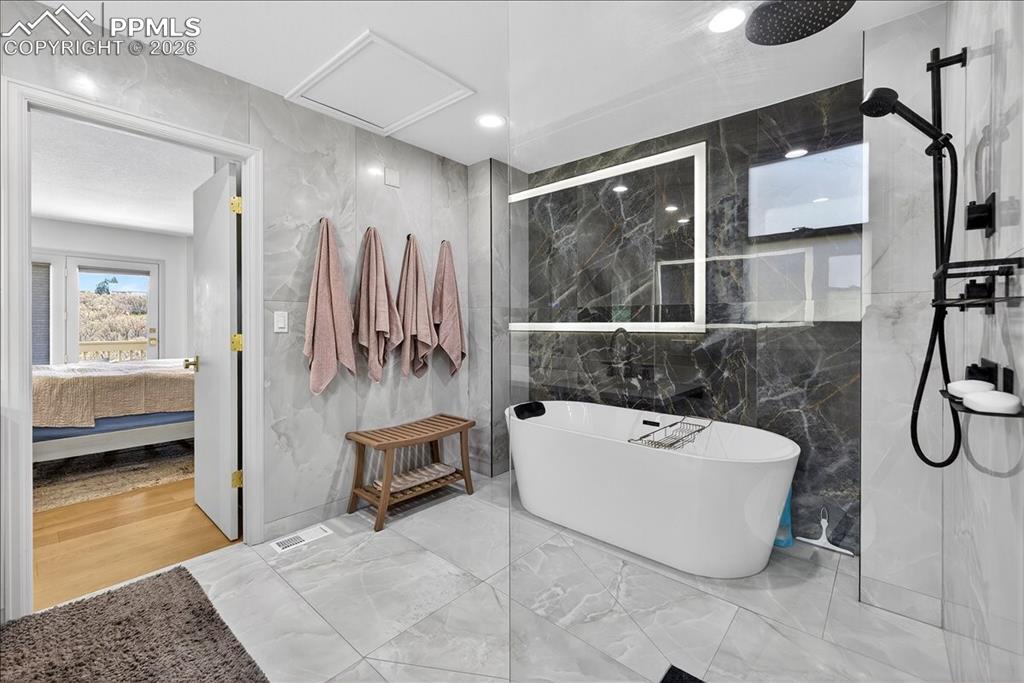 Image 18 of 50: Master Bathroom