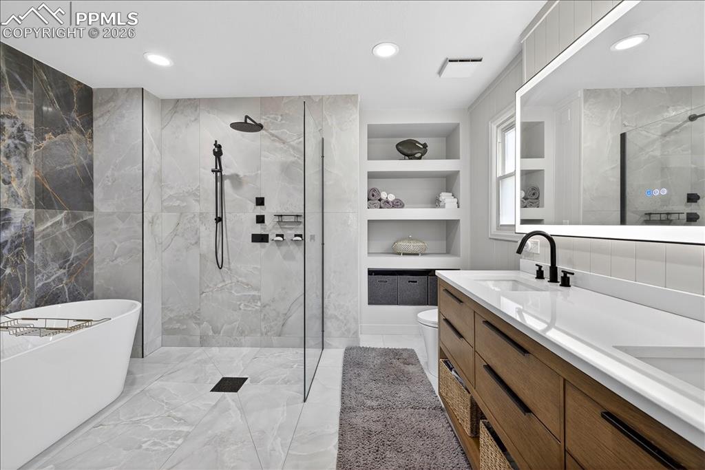 Image 19 of 50: Master Bathroom