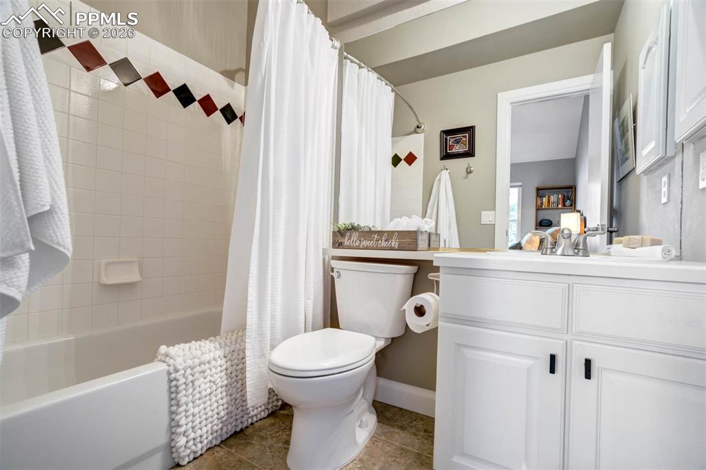 Image 34 of 50: Bathroom 4 featuring bath/shower, toilet and single sink.