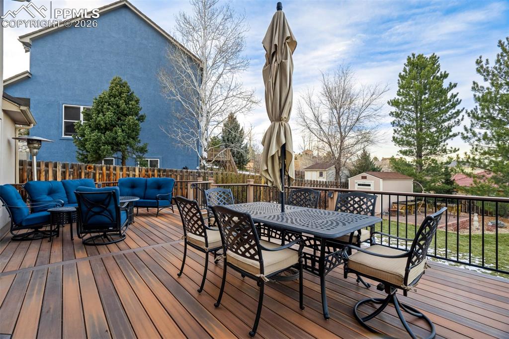 Image 46 of 50: Another view of the huge composite deck, stairs down to the professionally