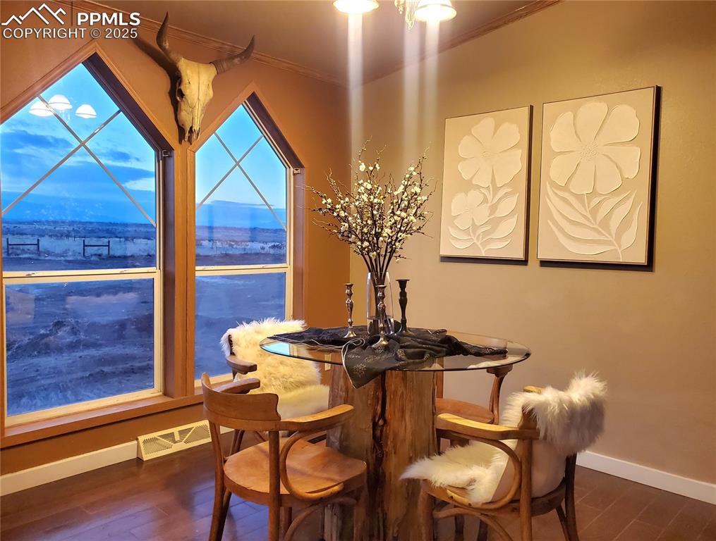 Image 2 of 50: Nightly views of the sunsetting over the mountains from the comfort of this