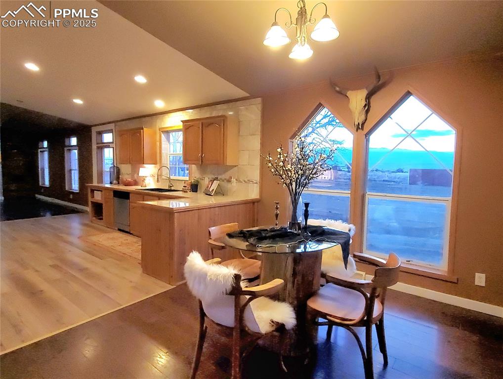 Image 24 of 50: Dining opens to kitchen, Kitchen opens to family room