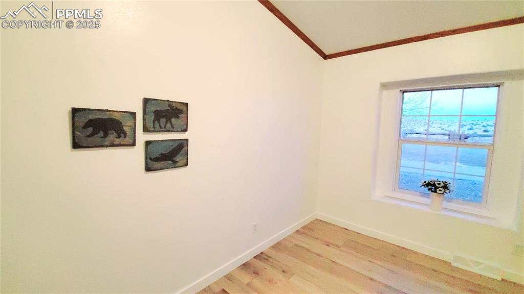 Image 35 of 50: Bedroom 4 is very spacious with a walk in closet, and is located off the fa
