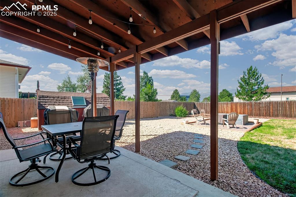 Image 18 of 29: There are moutain views from the covered patio! Close to Cherokee golf cour