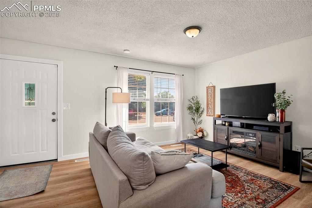 Image 4 of 29: Natural light, LVP flooring, open concept