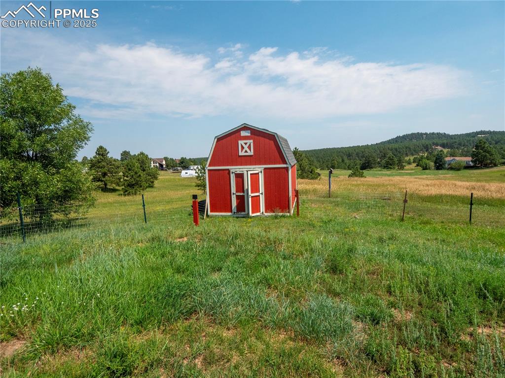 Image 20 of 39: View of shed with a view of rural / pastoral area