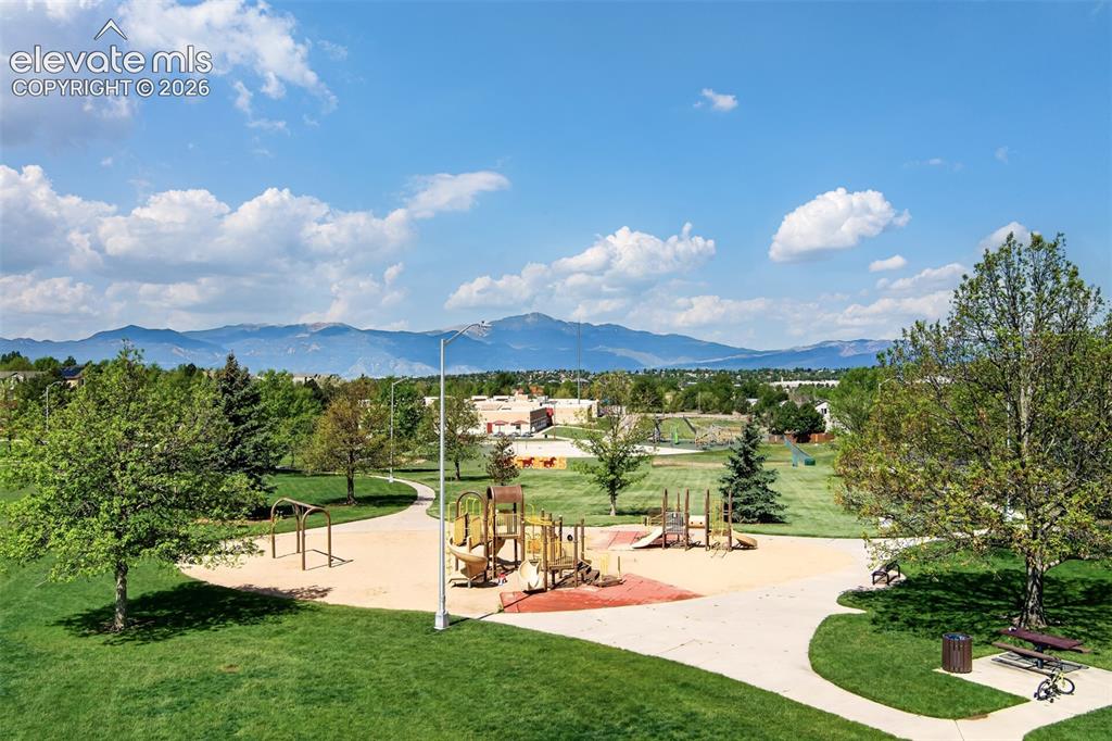 Image 42 of 46: Right across the street from the community, playground at Remington Park. T