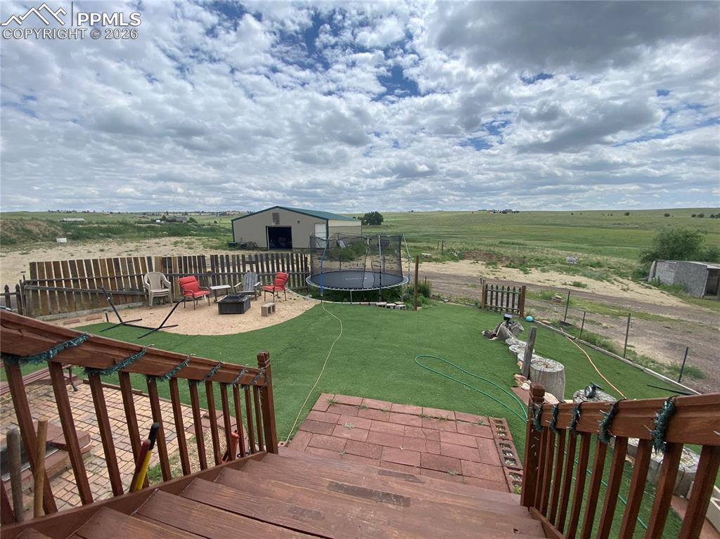 Image 32 of 50: Beautiful outdoor deck ideal for entertaining, relaxing, and enjoying summe