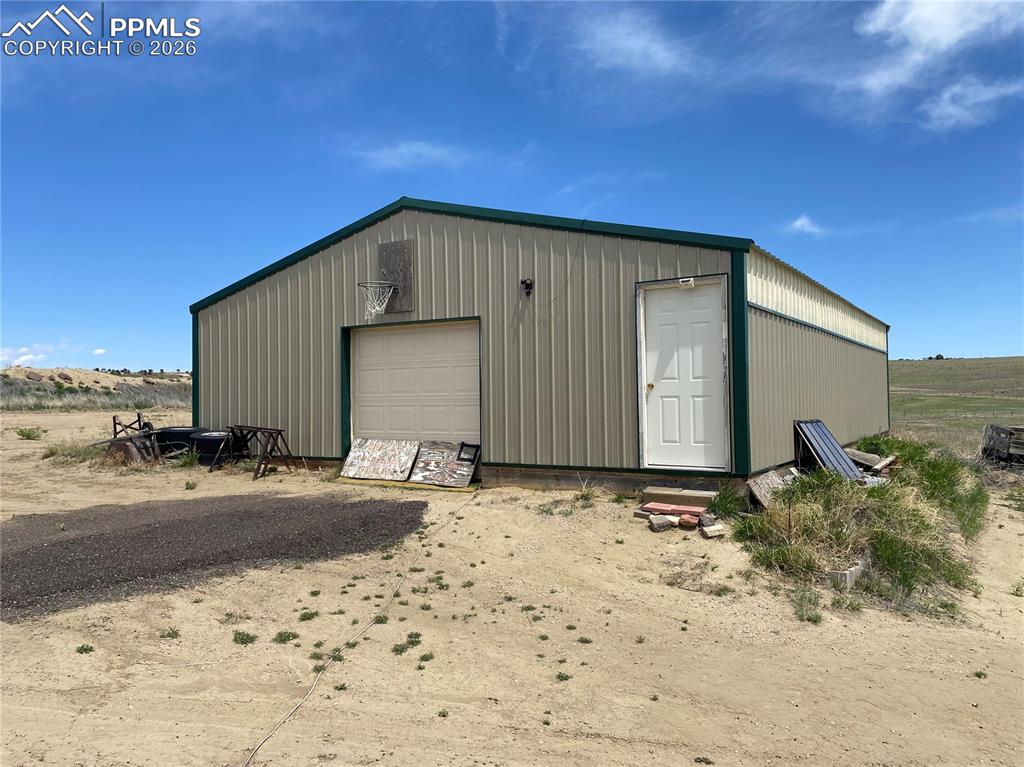 Image 33 of 50: Large solar-powered pole barn/workshop 