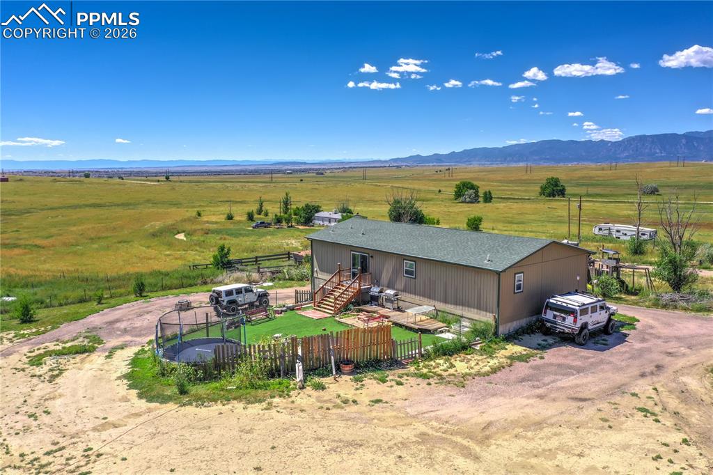 Image 42 of 50: Horse-ready property with secure fencing and expansive acreage for grazing,