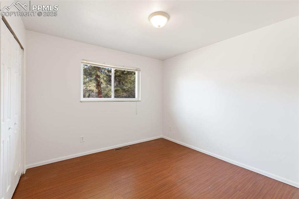 Image 11 of 20: Upper Level Bedroom 1