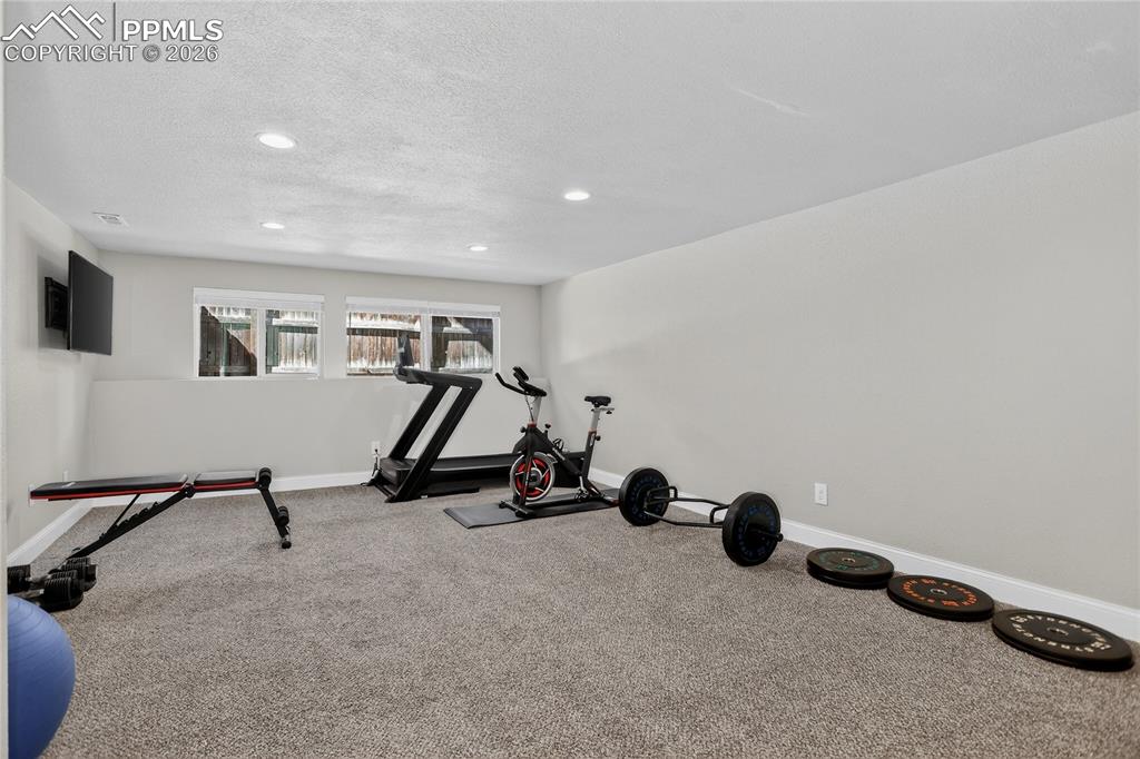 Image 22 of 28: Expansive rec room - lower level