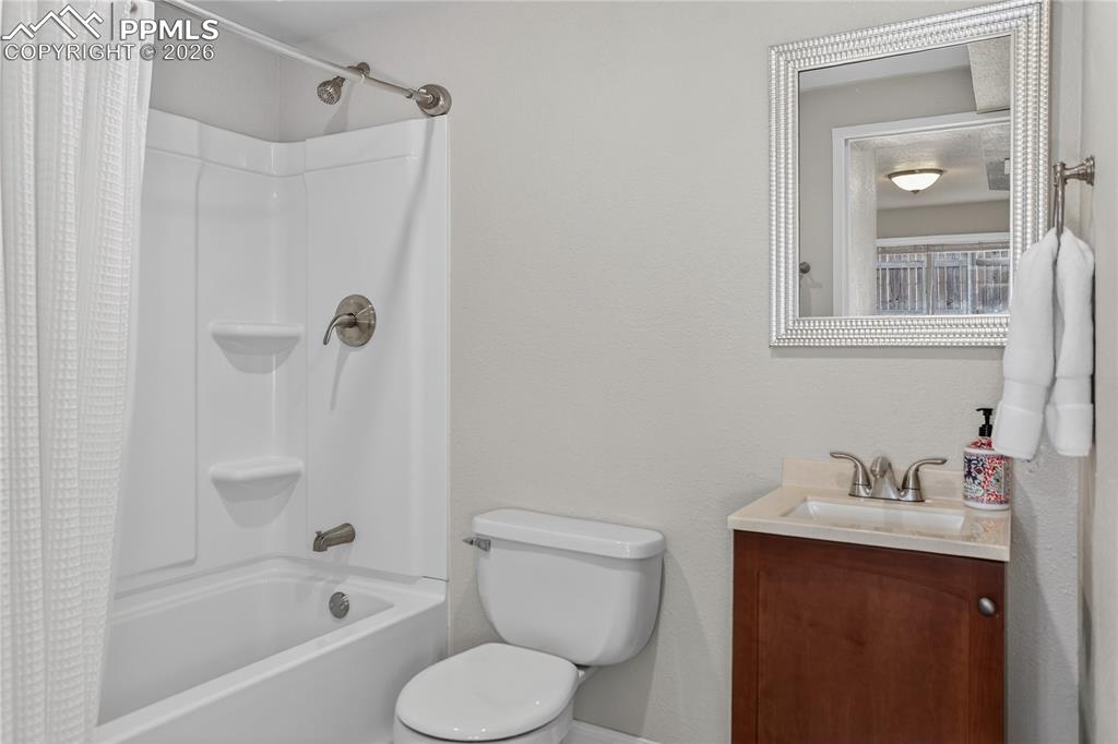 Image 24 of 28: Full guest bath - lower level