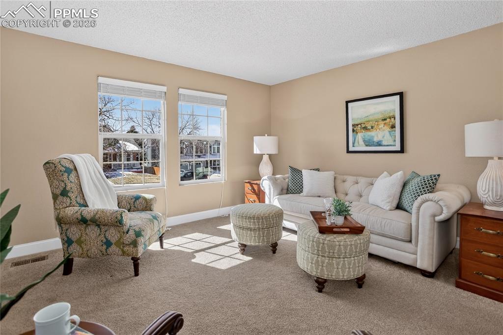 Image 3 of 28: Formal living room