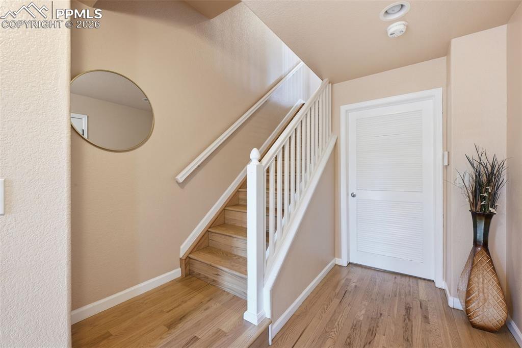 Image 5 of 27: Hardwood up the stairs