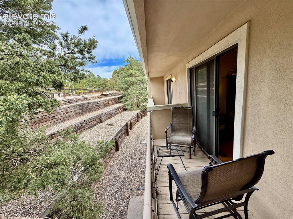 Image 14 of 26: View of patio / terrace with a balcony