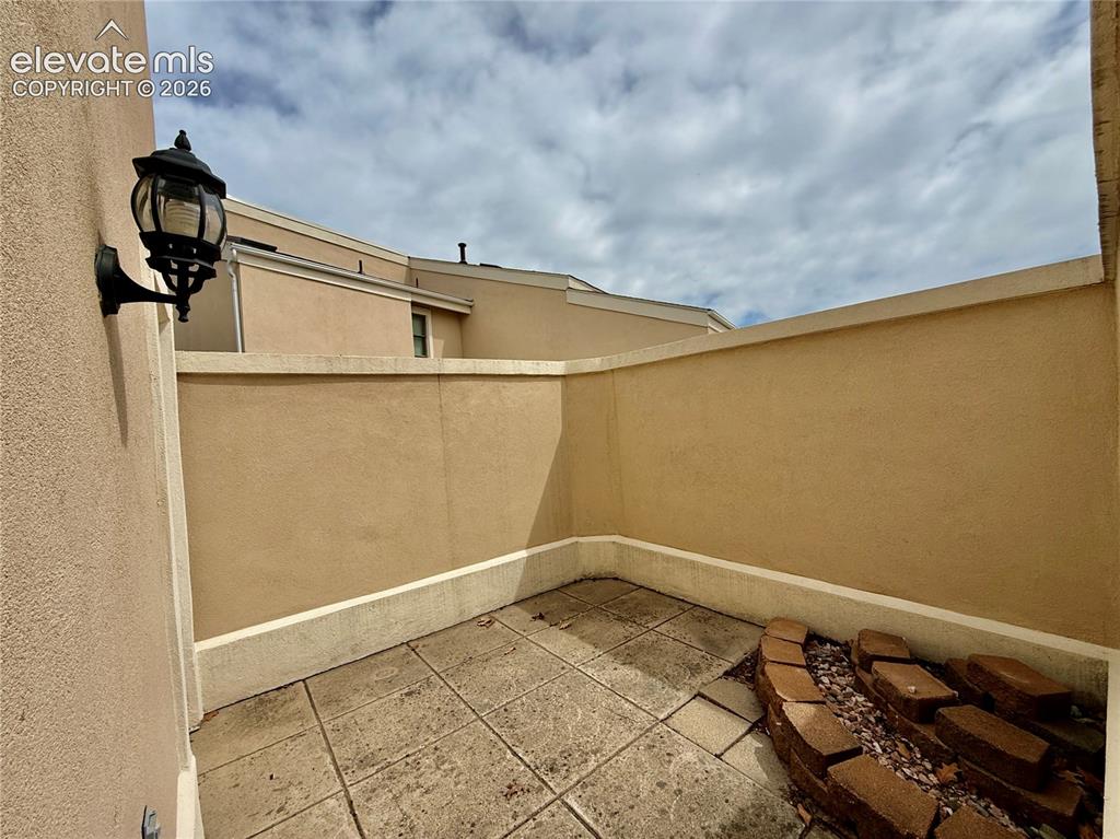 Image 25 of 26: View of front patio / terrace