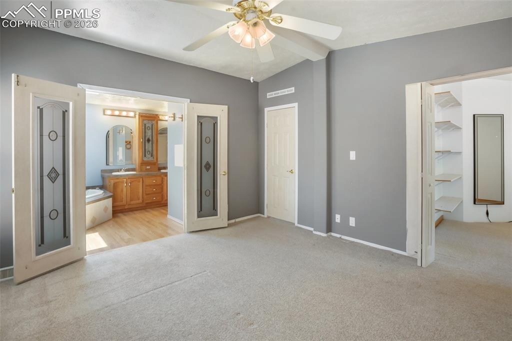 Image 18 of 28: Master Bedroom