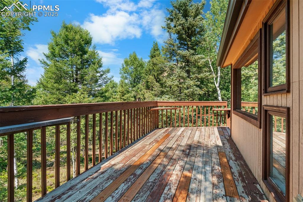 Image 17 of 46: Second floor deck is the perfect place to relax or grill out