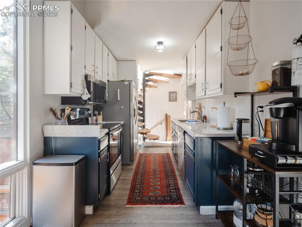 Image 21 of 46: Kitchen could be opened to make an entire open floor plan