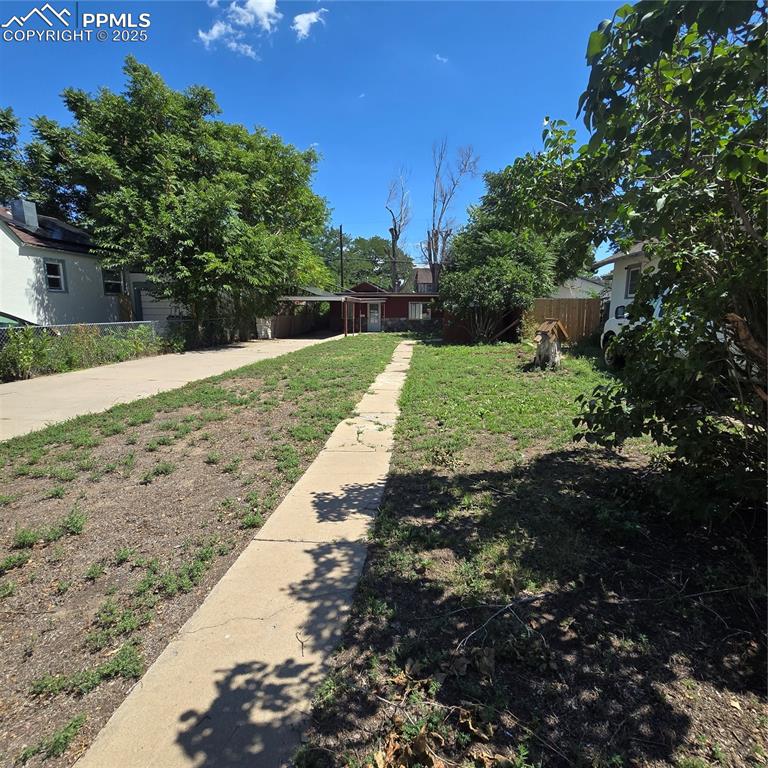 Image 26 of 28: Huge front yard with plenty of room to park an RV