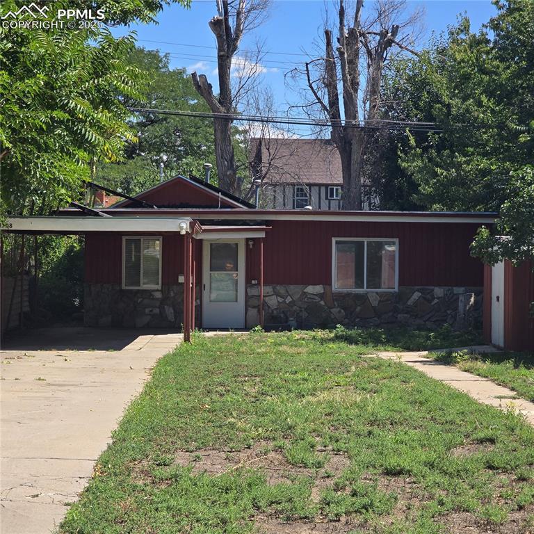 Image 28 of 28: View of home from sidewalk