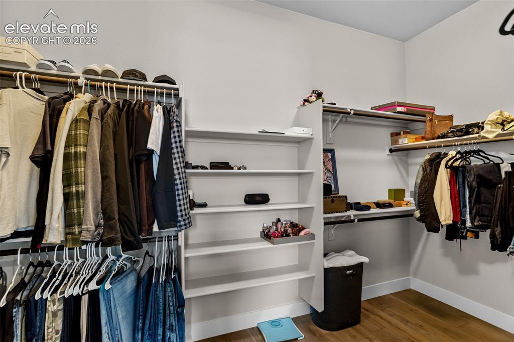 Image 12 of 29: Primary Closet