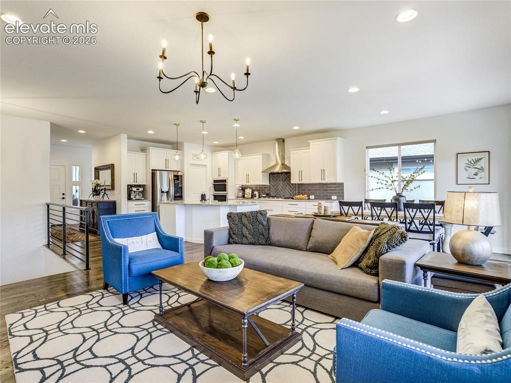 Image 12 of 50: An open floorplan offers a seamless flow from the living room to the kitche