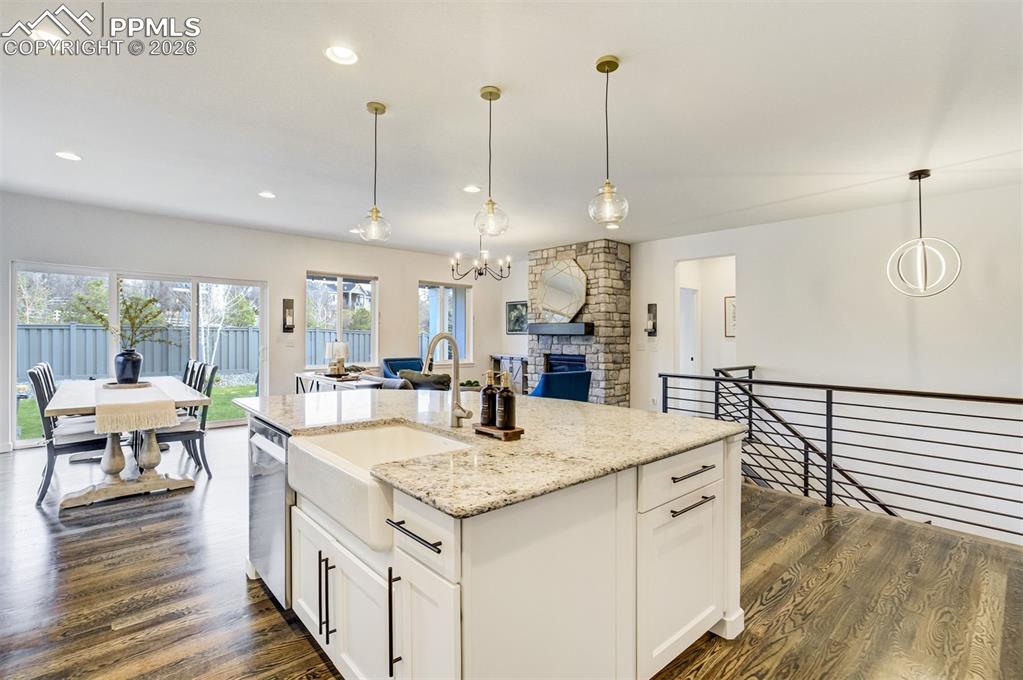 Image 13 of 46: Just inside the entry, this desirable home office or flex space is tucked a