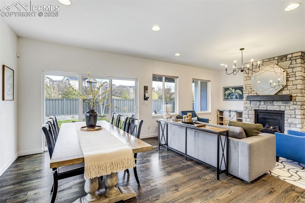 Image 15 of 46: The large center island is topped with granite and offers the perfect gathe